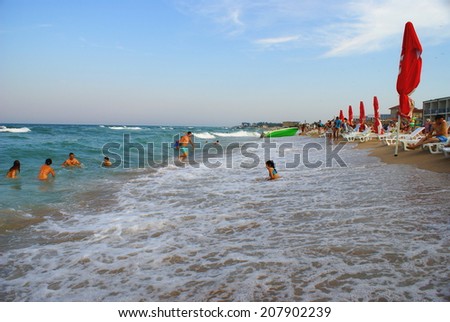 THE BLACK SEA AT EFORIE NORD,ROMANIA - JULY 27, 2014. People at the Black Sea, at the Eforie Nord  resort , in Romania.