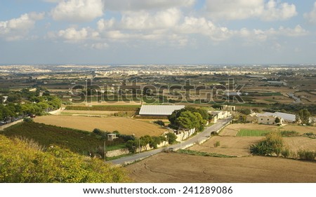 ISLAND OF MALTA - NOVEMBER 3, 2014. Autumn maltese landscape ,village with cultivated fields View from  the  old restaurant Point  De Vue .