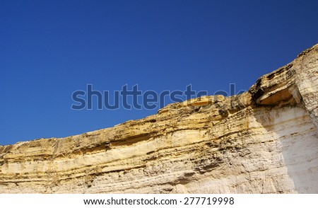 GOZO ISLAND, MALTESE ISLANDS ,EUROPE - NOVEMBER 5, 2014. Force of the nature. Amazing rock formation like a crocodile  seen from a boat trip at famous Azure Window, Dwejra cave in Gozo Island, Malta