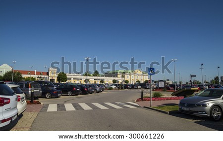 VIENNA, AUSTRIA - JULY 11, 2015. Parndorf Designer Outlet  - MCARTHUR GLEN OUTLET MALL ,exterior view of the outlet ,with 150 designer and fashion shops , on the road which links Vienna to Budapest.