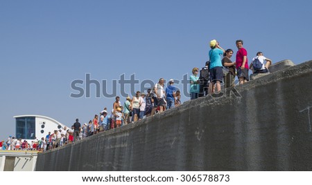 CONSTANTA, ROMANIA - JULY 15, 2015. Unidentified tourists on the walls at the Navy Day, famous event in every year at 15 July . Constanta Port Tomis, Romania.