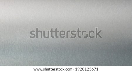 Metal background or texture of light brushed steel plate, rusty steel texture