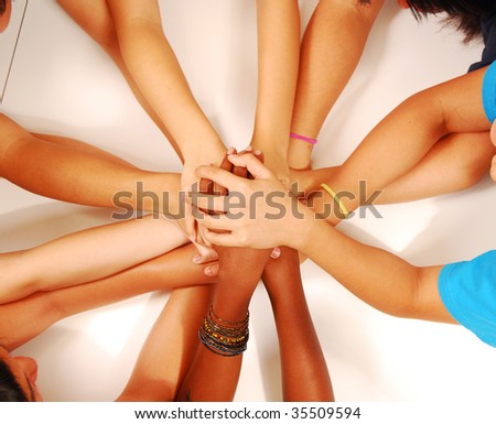 hands stack together