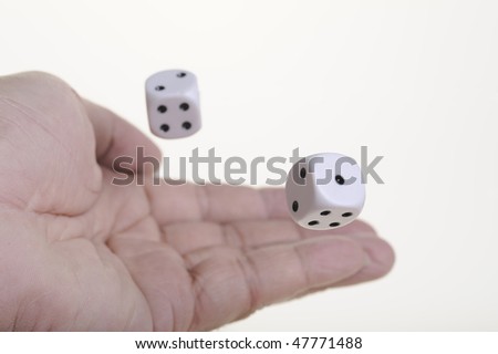 hand throwing two dices