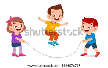 happy cute kids boys and girl play jump rope