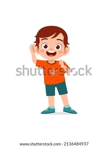 little boy standing and try to hear sound