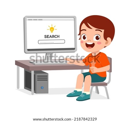 cute little kid use computer to study internet