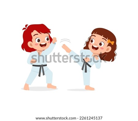 cute little kid training karate with friend together