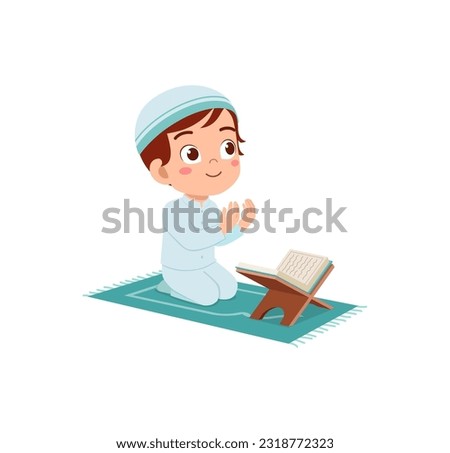 little muslim kid show pray pose and read quran