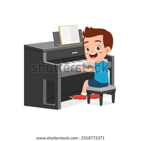 little kid play piano and feeling happy