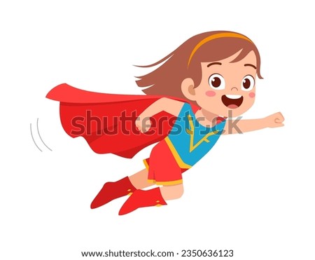 little kid wearing super hero costume and feel happy