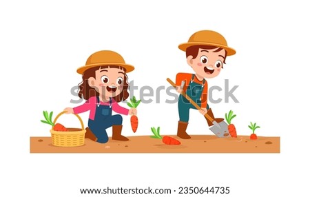 little kid harvesting carrot and feel happy