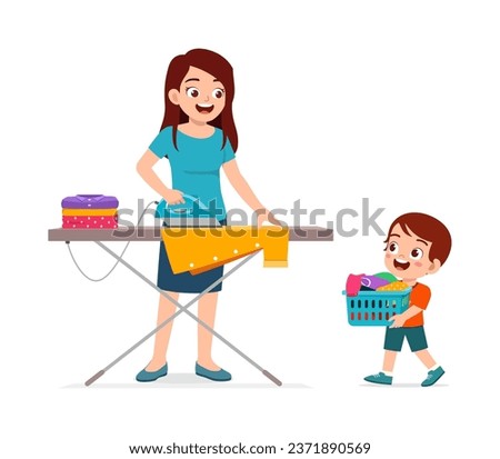 little kid helping mother ironing clean clothes