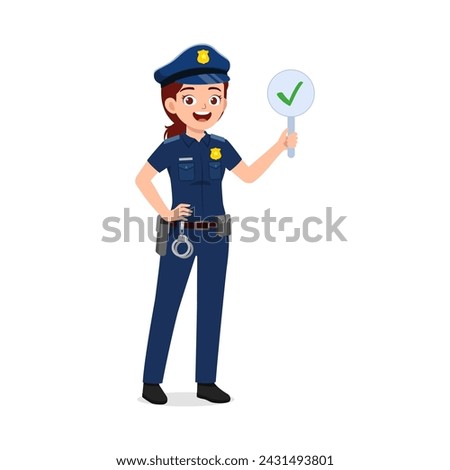 police woman holding check mark board