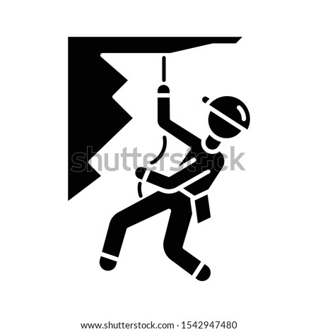 Mountain climbing glyph icon. Alpinism, mountaineering. Abseiling, rappelling descend. Spelunking. Mountaineer sliding down rope. Silhouette symbol. Negative space. Vector isolated illustration