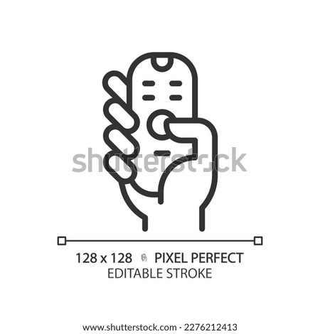 Hand with remote control pixel perfect linear icon. Digital device with keys. Contactless infrared gadget. Thin line illustration. Contour symbol. Vector outline drawing. Editable stroke
