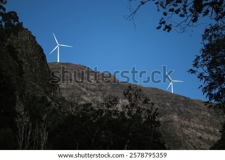 Similar – Image, Stock Photo Wind turbine with rising sun