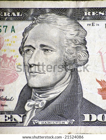 Engraved portrait of Alexander Hamilton on a USA ten dollar bill.