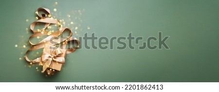 Similar – Image, Stock Photo Christmas tree decorations made of glass in the shape of a star hang in the Christmas tree. In the background you see blurredly even more tree decorations
