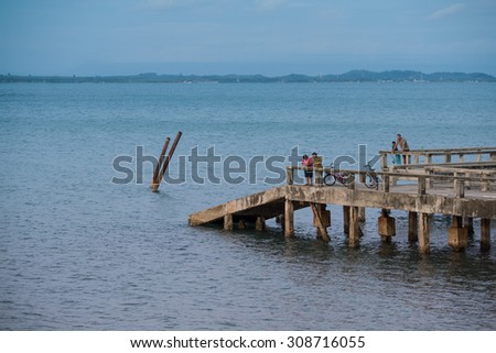 Thailand Aug 14 2015, children and people on bridge between fishing on bridge at Kho-Chang island,Trat province,Thailand