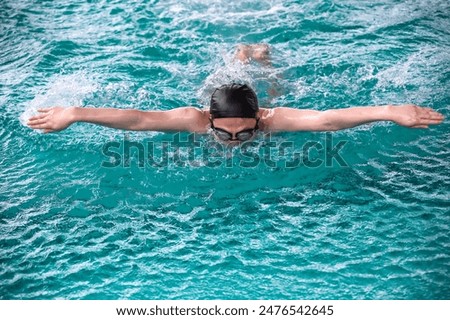 Similar – Image, Stock Photo Man swims in the sea