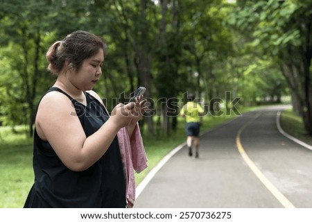 Similar – Image, Stock Photo Sportswoman with curvy body stretching leg on urban pavement