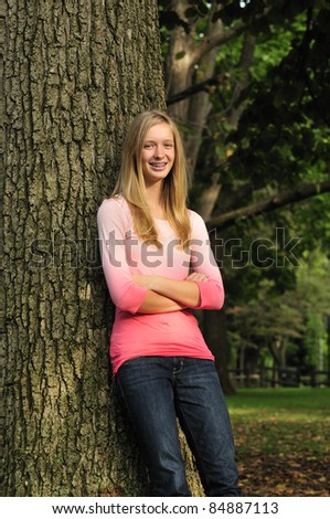 pretty teenage girl with braces smiling