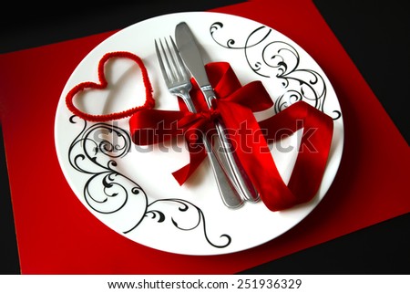 st Valentines dinner plate decoration close up soft focus