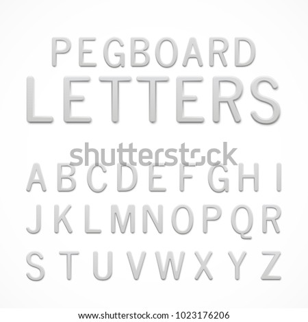 Set of white plastic pegboard letters. ABC letters isolated on white background. Plastic model-kit alphabet. Pegboard letters for your project.