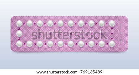 Pink packaging of birth control pills. Contraceptive pill, hormonal pills, birth control pills. Women oral contraception. Planning pregnancy concept.Realistic blister with contraceptive pills.