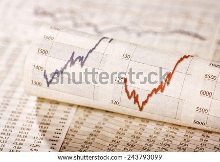 Diagrams with rising share prices and exchange rate tables