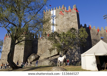 GUIMARAES, PORTUGAL - SEPTEMBER 16: Medieval themed fairs; arts, crafts, and activities centered around the Medieval period at FEIRA AFONSINA, on September 16, 2012 in Guimaraes, Portugal