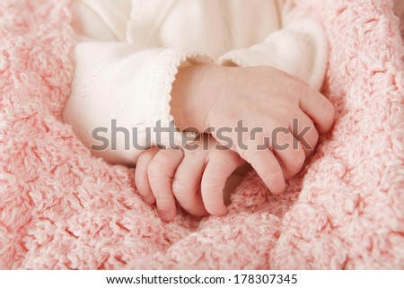 baby hands detail, studio picture