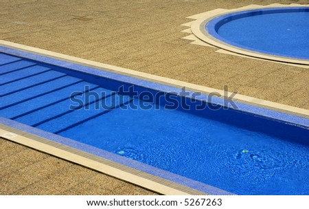 swimming pool blue water in a summer day