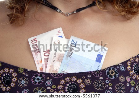 Casual young woman with money in the chest