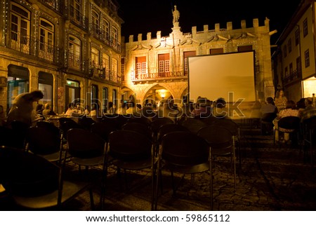 GUIMARAES, PORTUGAL - AUGUST 26: Cinema festival at night, main center of Guimaraes on Oliveira Square August 26, 2010 in Guimaraes, Portugal