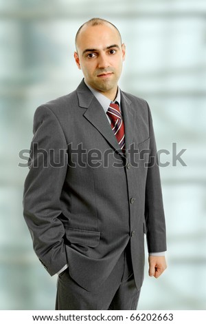 pensive young business man close up portrait