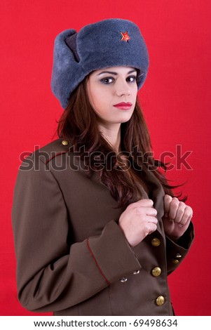http://image.shutterstock.com/display_pic_with_logo/2300/2300,1295708602,1/stock-photo-young-beautiful-woman-dressed-as-russian-military-69498634.jpg