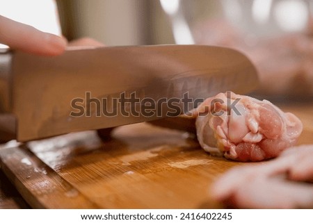 Similar – Image, Stock Photo Hand mit frischen halbierten Orangen auf einem Holzschneidebrett auf einem schwarzen Hintergrund