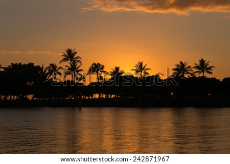 Description:  Late evening glow and silhouette at Honolulu Lagoon. Title:  \