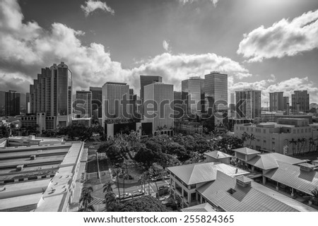 Honolulu, Feb. 24:  Monochrome photograph of the Honolulu Financial District and the Koolau Mountains.  Honolulu, Hawaii, USA.  February 24, 2015.