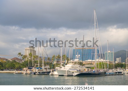 Honolulu, Hawaii, USA, April 25, 2015: Tropical clouds above the world famous Waikiki Yacht Club.  Located in Honolulu, the Waikiki Yacht club is host to the 2015 Transpacific Sailboat Race.