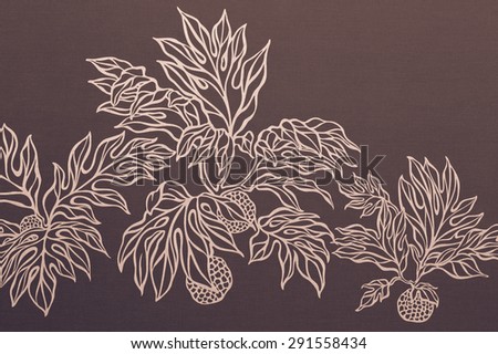 Hawaiian jungle cotton fragment from a 1950\'s shirt with silver plant and leaves on a brown background.