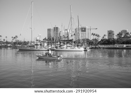 Honolulu, Hawaii, USA, June 29, 2015:  Waikiki morning view of the sailboats at the Waikiki Yacht Club.  Waikiki is a world class sailing destination.