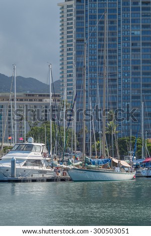 Honolulu, Hawaii, USA, July 27, 2015:  Morning at Waikiki Yacht Club and a rare visit by a antique schooner  arriving back from an extended voyage to Polynesia. The Waikiki Yacht Club is world famous.