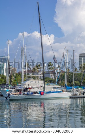 Honolulu,Hawaii,USA, August 7, 2015:  Racing sailboat arrival at the Waikiki Yacht Club and first order of business is drying the sea gear.  Waikiki Yacht Club is Hawaii\'s premier yacht club.