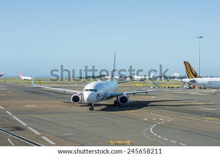 SYDNEY - December 30: Aircrafts of the Virgin Australia fleet at Sydney Domestic Airport December 30, 2014. Virgin Australia is Australia\'s second largest airline