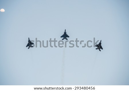 Singapore - june 27, 2015:Fiftieth anniversary of the Singapore National Day rehearsal, fighter formation flew over the city