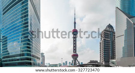 SHANGHAI-September 24, 2015 Oriental Pearl Tower on blue sky background.Tower 470 meter the Oriental Pearl is one of Shanghai\'s tallest buildings, at Lujiazui finance and trade zone in Pudong