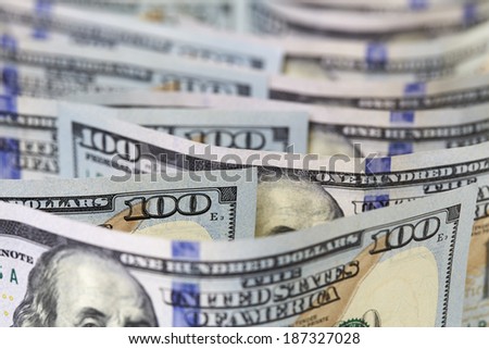 One hundred dollars notes background. Low DOF